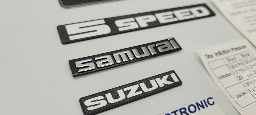 66157ce0b4c67c3eeb3006ec-suzuki-samurai-emblems-and-decals.webp
