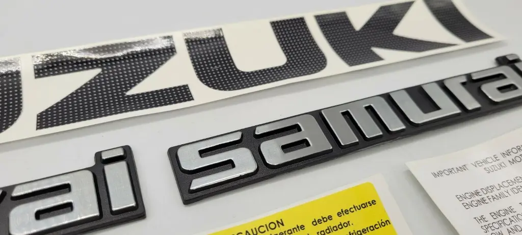 66157ce0b4c67c3eeb3006e6-suzuki-samurai-emblems-and-decals.webp