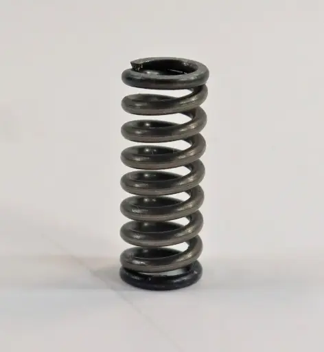 SPRING UNDER TRANSMISSION SHIFT COVER ON MAHINDRA TRACTOR (006502304R1)