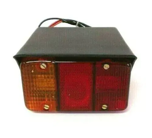 LAMP THREE IN ONE L.H. WITH HOUSING FOR MAHINDRA TRACTOR 005559235B91